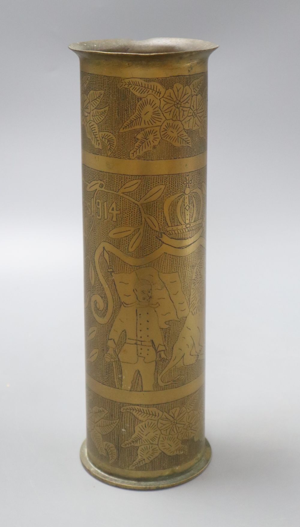 An early 20th century Trench Art vase reads Somme 1916 and Ypres 1914, height 27.5cm